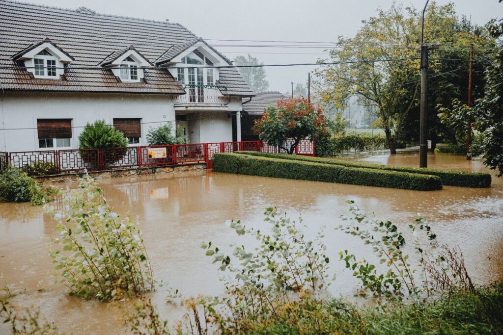 Water damage restoration marketing in Rockaway NJ, flooded suburban home after heavy rain