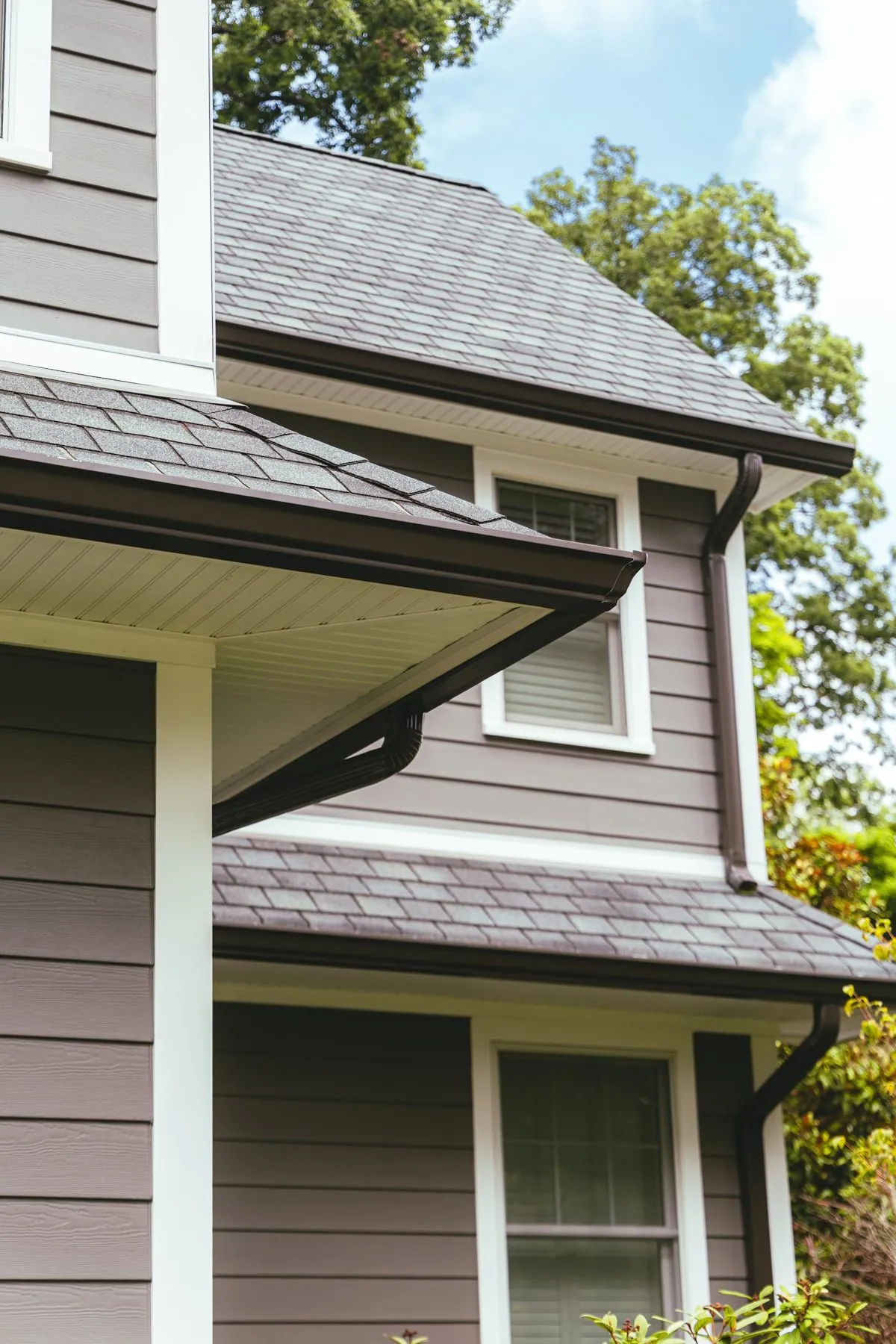 Shingle roofline, gutter and siding corner on a North Jersey home photographed by The Hype Hero
